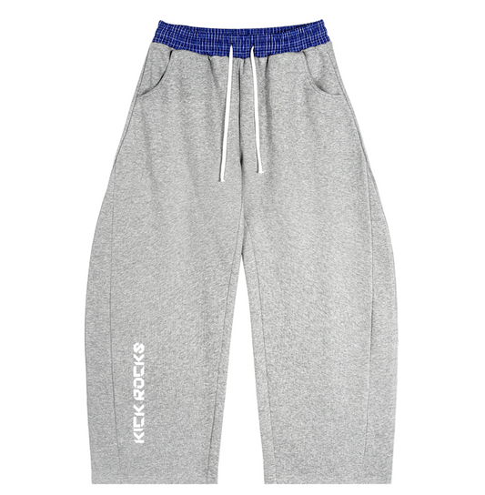 grey "kick rocks" trackies